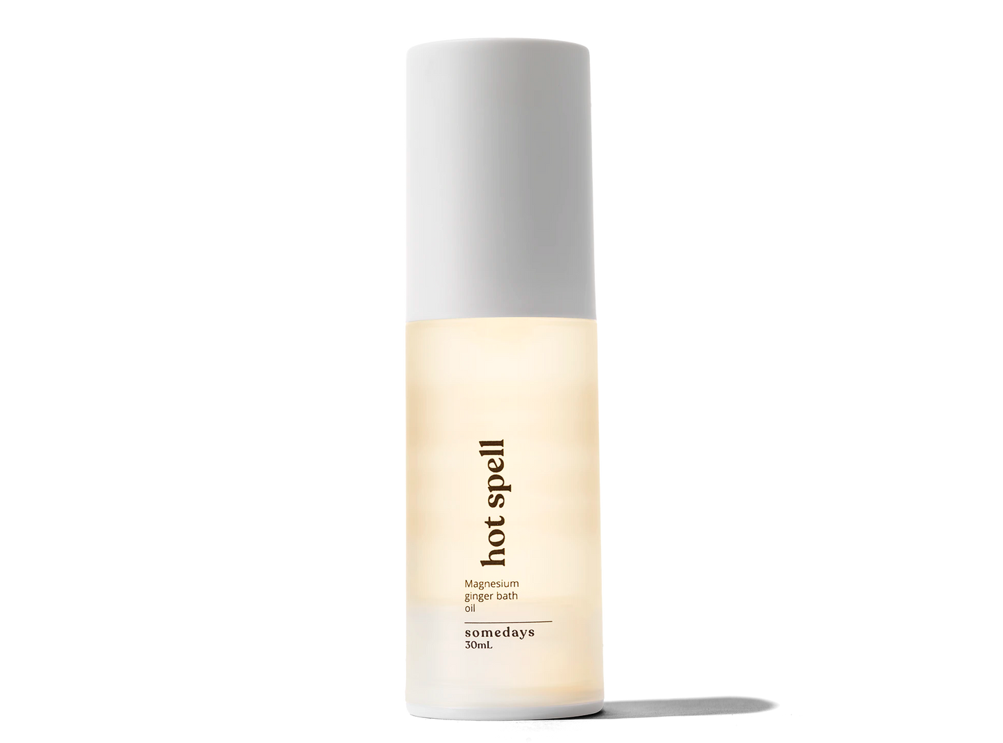 Skincare bottle labeled 'hot spell' with a white cap on a white background