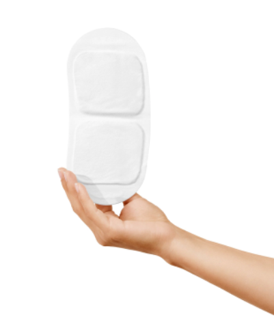Hand holding a white electronic device on a white background
