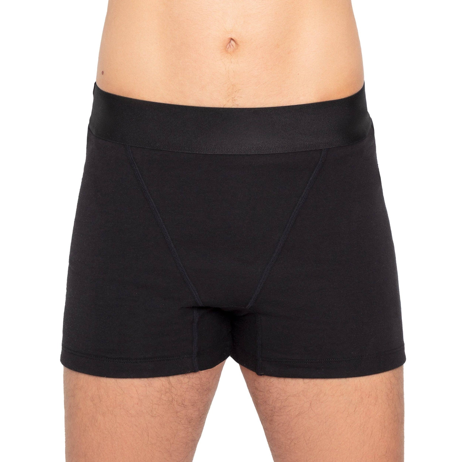 Black period boxer briefs worn by a person on a white background